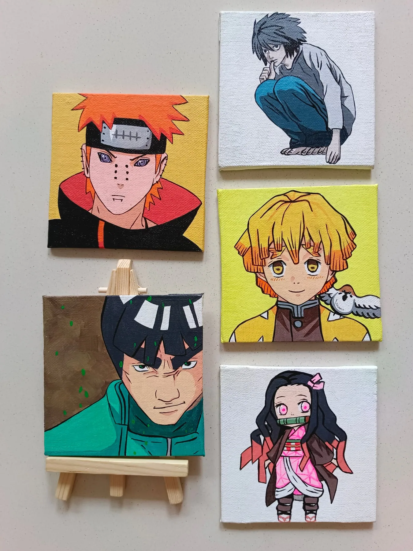 Assorted hand-painted acrylic mini canvases featuring Pain, Sasuke Uchiha, Zenitsu Agatsuma, Nezuko Kamado and other anime characters.