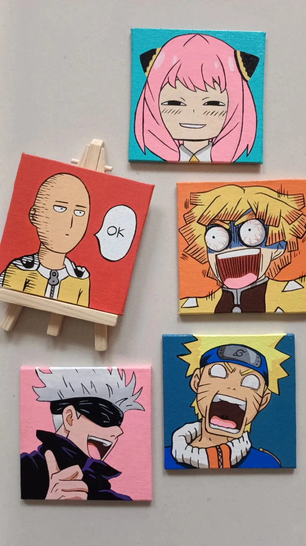 Hand-painted mini canvas set featuring Anya Forger, Saitama, Monkey D. Luffy, Satoru Gojo and Naruto Uzumaki with comic-style characters.