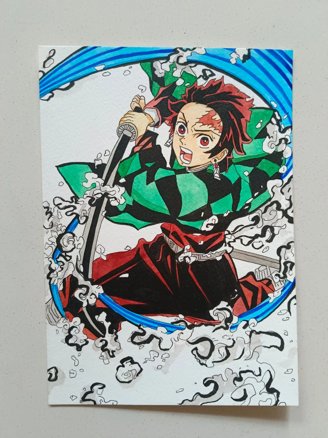 Hand-painted acrylic action painting of Tanjiro Kamado from Demon Slayer using a water-breathing sword technique amid swirling blue waves.