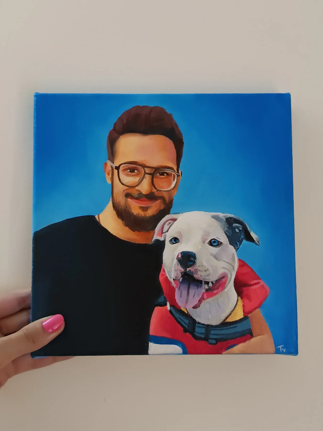 Hand-painted acrylic canvas portrait of a person with a white dog against a bright blue background.